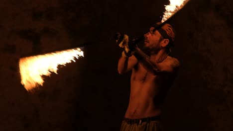 Slow-motion-shot-of-a-man-performing-with-a-fire-whip
