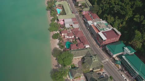 Aerial-tilt-down-shot-of-tropical-island-beach-and-resort-hotels-Koh-Chang,-Thailand