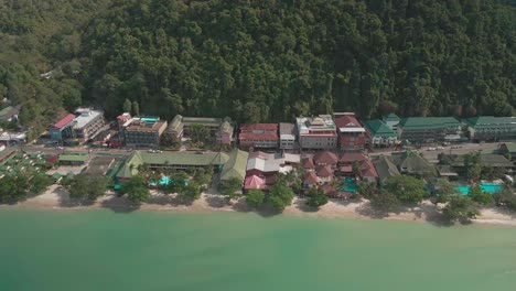 Aerial-view-of-white-sand-beach-and-empty-resorts-due-to-travel-restrictions