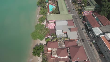 aerial-view-of-hotels-on-white-sand-beach-road-in-Koh-Chang,-Thailand