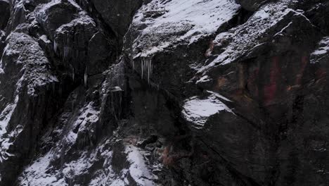 Stone-wall-in-harsh-rocky-landscape-of-the-Scandinavian-Mountain-Range---Aerial-push-in