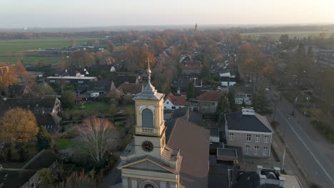 Aerial-of-golden-crucifix-on-top-of-church-tower