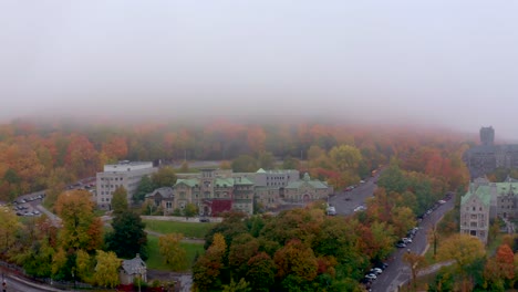 Aerial-shot-of-the-Mount-Royal-mountain-on-a-misty-fall-dawn