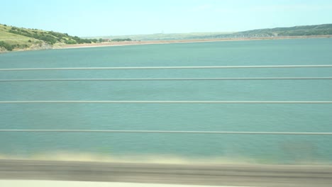 Driving-over-a-wide-river-in-South-Dakota