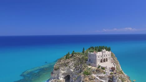 Aerial-view-of-Tropea-Sanctuary-from-drone-with-city-beach-in-summer-season
