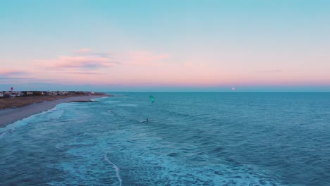 Kitesurfing-alone-by-empty-new-Jersey-beaches-at-sunset-pink-horizon