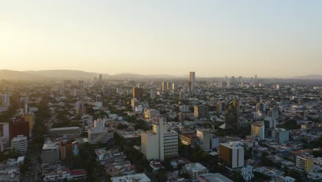Backward-Aerial-Flight-Reveals-Guadalajara,-Mexico-City