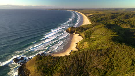 Epic-rotating-drone-shot-of-crashing-waves-at-Broken-Head-beach-near-Byron-Bay