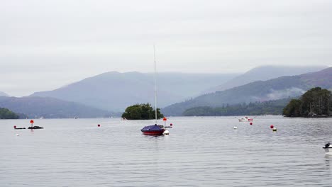 Zoomed-in-view-of-Lake-Windermere-in-the-Lake-District-with-the-distant-fells-shrouded-in-low-cloud