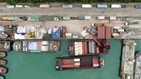 Small-feeder-type-Container-barges-operating-in-Hong-Kong-pillar-point-dock