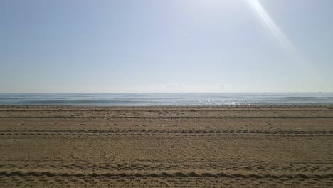 Horizontal-shot-of-empty-beach-on-a-clear-sunny-day