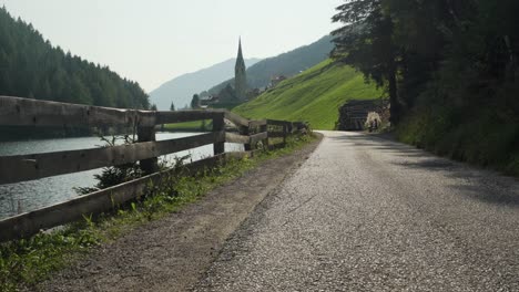 Scenic-road-at-Lake-Durnholz-with-stunning-background,-Handheld-shot