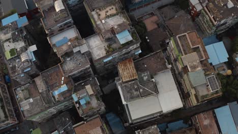 Fly-over-old-rusty-roofs-of-Dongshankou-district-buildings-of-Guangzhou-city