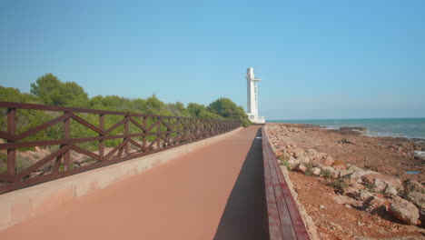 Alcossebre-lighthouse-promenade-or-boardwalk-on-the-mediterranean-coast,-in-the-Serra-Irta-natural-park,-Spain