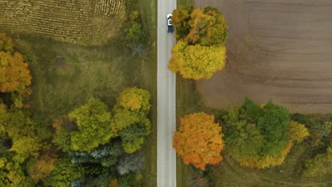 Aerial-View-Car-Driving-on-Rural-American-Road