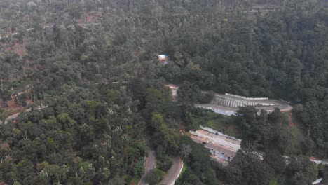 Yercaud-highway-hairpin-bend-covered-with-thick-lush-of-trees-in-the-forest