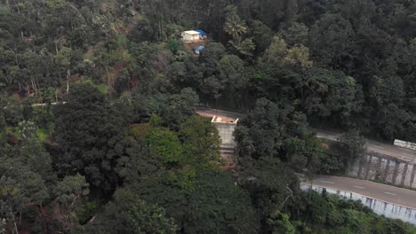 Yercaud-highway-hairpin-bend-covered-with-thick-trees-in-the-forest