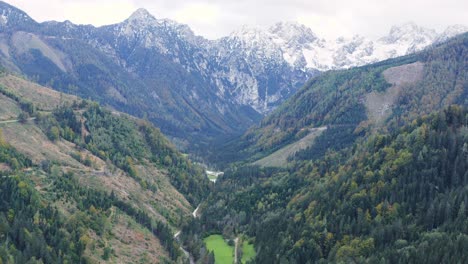 Aerial-mountains-valley,-drone-view-of-Eisenkappel-Vellach,-Austria