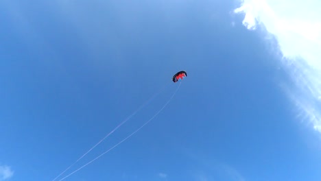 Power-kite-flying-across-a-blue-summer-sky