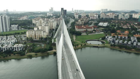 Aerial-parallax-of-Seri-Wawasan-Bridge-on-cloudy-day-in-Kuala-Lumpur