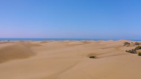Birds-eye-view-over-sand-dunes-at-Maspalomas,-Canary-islands