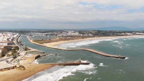 Panoramic-view-of-Fort-of-Lagos-protecting-the-Bensafrim-River's-quay---Aerial-Orbit