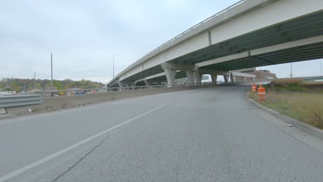 POV-driving-on-exchange-ramps-on-Interstate-I74-near-the-Mississippi-River-in-Moline-Illinois