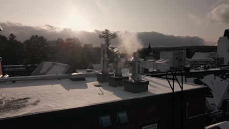 Smoke-Coming-Out-Of-Chimney-Of-Building-Near-Bishop's-University-McGreer-Hall-On-A-Cold-Morning-In-Winter-In-Quebec,-Canada