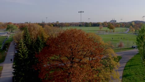 Aerial-shot-of-a-soccer-field-on-an-autumn-sunny-morning