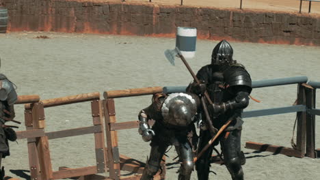 Slow-motion-track-shot-of-battle-between-old-knights-in-armor