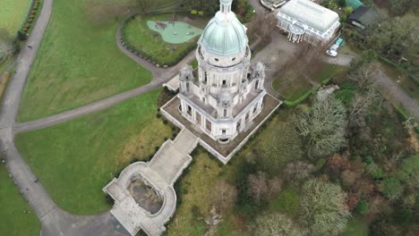 Aerial-view-landmark-historical-copper-dome-building-Ashton-Memorial-English-countryside-rising-birdeseye-view