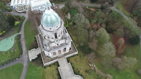 Aerial-view-landmark-historical-copper-dome-building-Ashton-Memorial-English-countryside-birdseye-orbit-right
