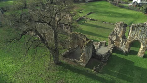 Basingwerk-abbey-landmark-medieval-abandoned-Welsh-ruins-Aerial-view-descending-birdseye