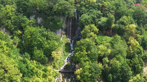 Aerial-View-Of-The-Beautiful-Sopotnica-Waterfalls-On-The-Slopes-Of-Jadovnik-Mountain-In-Serbia---aerial-descend