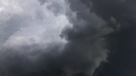 a-thunderstorm-inside-a-thick,-dark-gray-cloud