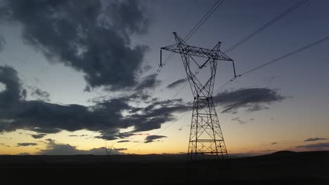 Transmission-Tower-front-of-a-Beautiful-Sunset-Landscape