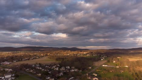An-aerial-time-lapse-of-the-landscape-with-the-clouds-passing-overhead-on-a-fall-day