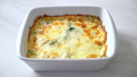 baked-spinach-lasagna-with-cheese-in-white-plate