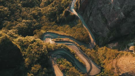 Aerial-view-dangerous-beautiful-rainforest-mountain-road,-top-down-aerial-view