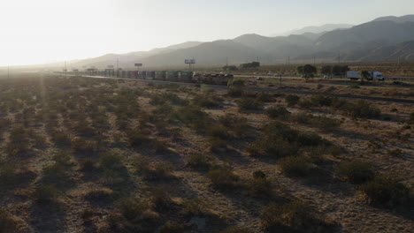 Locomotive-Train-Mode-of-Transportation-in-Western-America-Desert,-Aerial