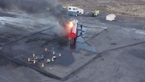 Fire-blazing-on-dummy-aircraft-at-airport-training-grounds-in-Iceland