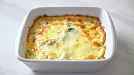 baked-spinach-lasagna-with-cheese-in-white-plate