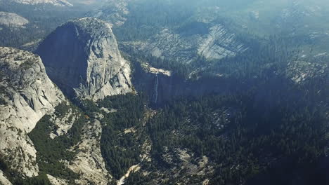 Aerial-Shot-Of-Cascading-Waterfall-In-Valley-Of-Yosemite-National-Park,-Travel-Destination-In-California