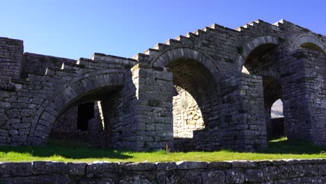 Stone-stairs-on-arched-thick-walls-of-medieval-castle-remaining-from-ancient-era