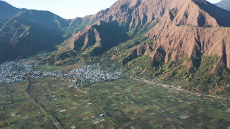 Aerial-of-popular-Sembalun-landscape-with-agriculture-and-volcanic-mountains