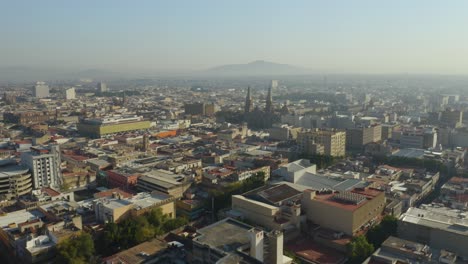 Drone-Approaches-Guadalajara-Cathedral-,-Mexico.-Smog.-Hazy