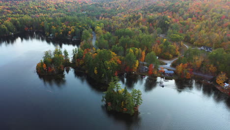 Aerial-View-of-Coastal-Road-and-Scenic-Lake-Front-With-Colorful-Autumn-Forest-in-Vermont-Countryside,-USA