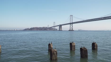 Still-Shot-of-Cars-Traveling-Across-the-Bay-Bridge-on-a-Calm-Sunny-Day-in-San-Francisco