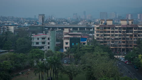 Navi-Mumbai-India-day-to-night-timelapse-seawards-city-line-areal-view