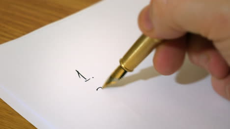 Numbers-are-written-in-a-list-on-a-blank-sheet-of-paper-with-a-fountain-pen-in-ink